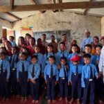 खान पुगोस् दिन पुगोस् अभियान अन्तर्गत डडेल्धुरामा विद्यार्थीलाई पोसाक वितरण